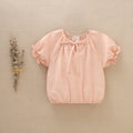Blouse pour fille à manches courtes bouffantes et col noué: Saumon
