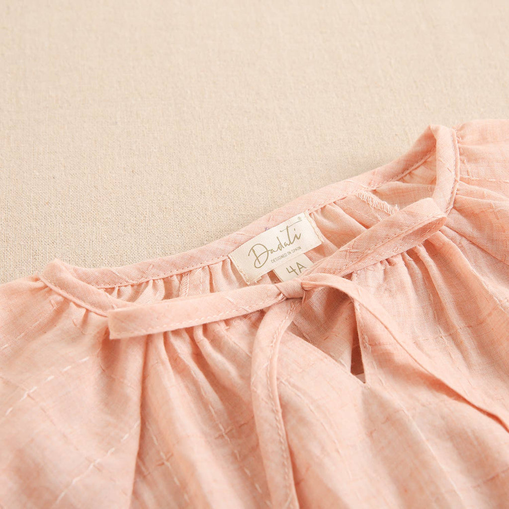 Blouse pour fille à manches courtes bouffantes et col noué: Saumon