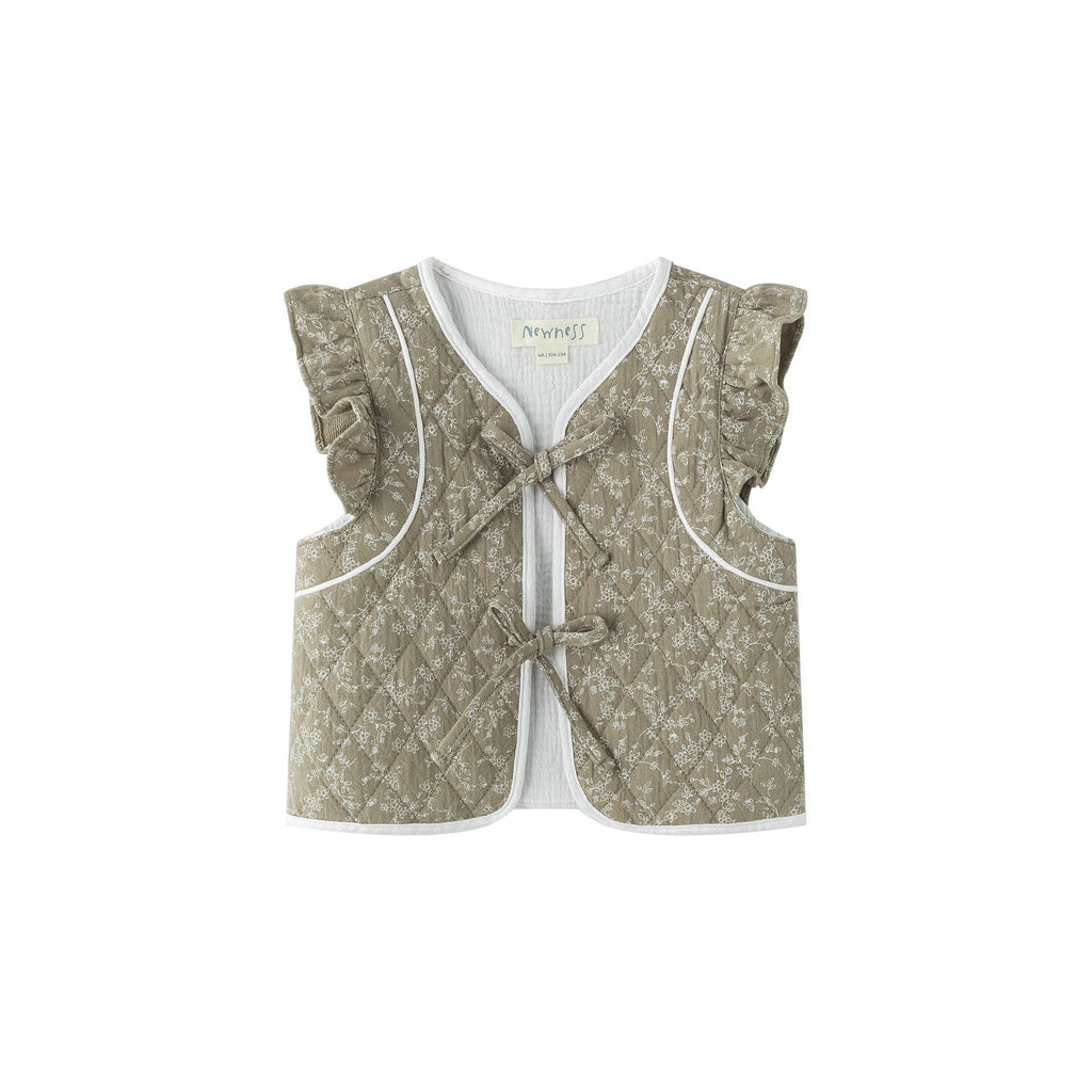 Gilet matelassé, volants aux épaules et nœud