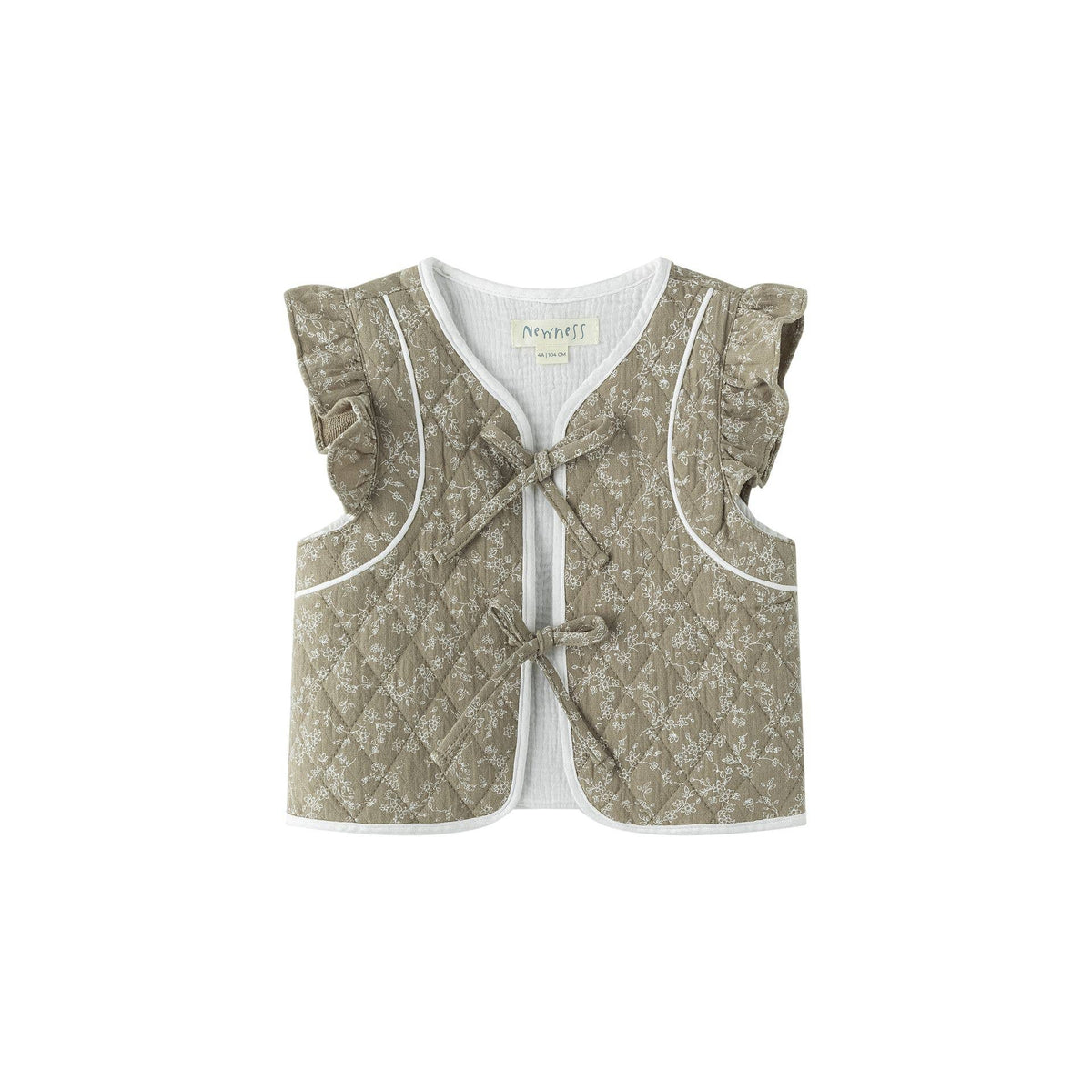 Gilet matelassé, volants aux épaules et nœud